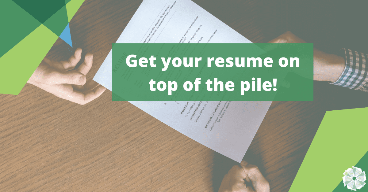 There is a person handing someone a resume