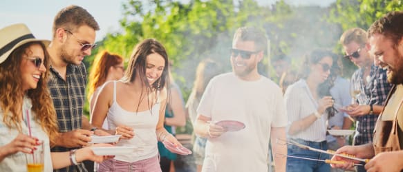 employees enjoy summer at a company barbeque
