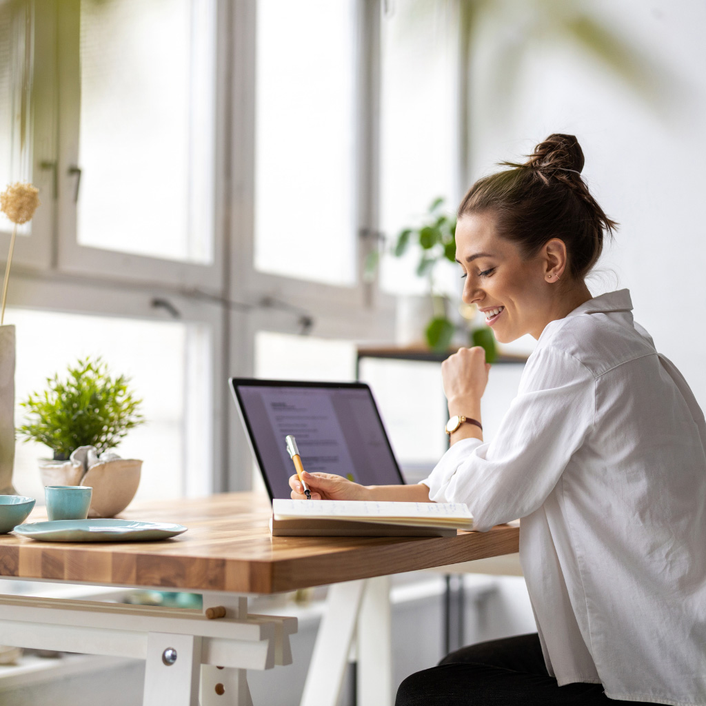 Addison Group candidate page image featuring a woman on her computer