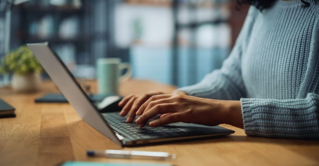 Someone using Addison Group's tips to follow up after an application and interview