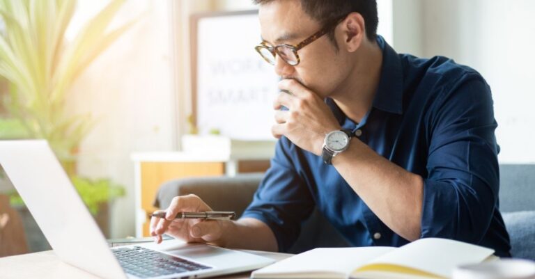 Recruiter reviewing a candidates information using Addison Group's criteria