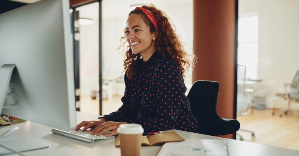 Hiring manager reading Addison Group's tips about the benefits of skills-based hiring for administrative roles