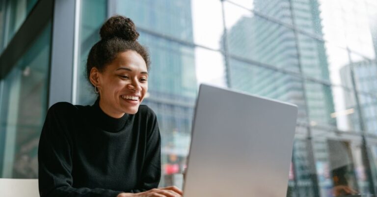 Someone writing effective job description using Addison Group's tips