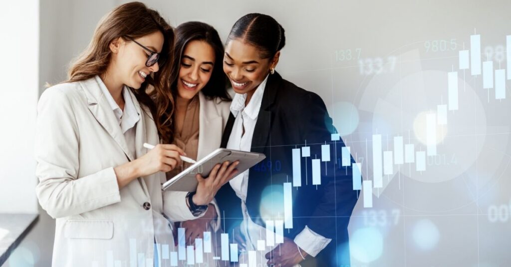 Group of finance professionals reading Addison Group's article about where accounting professionals create value in the age of AI