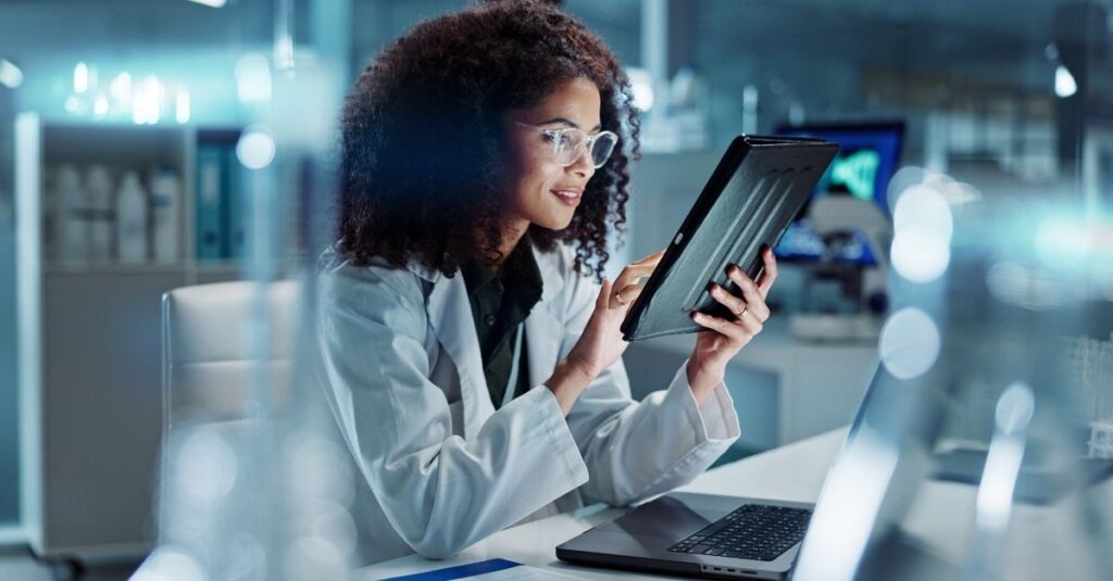 Non-clinical healthcare reading Addison Group's article about top AI trends